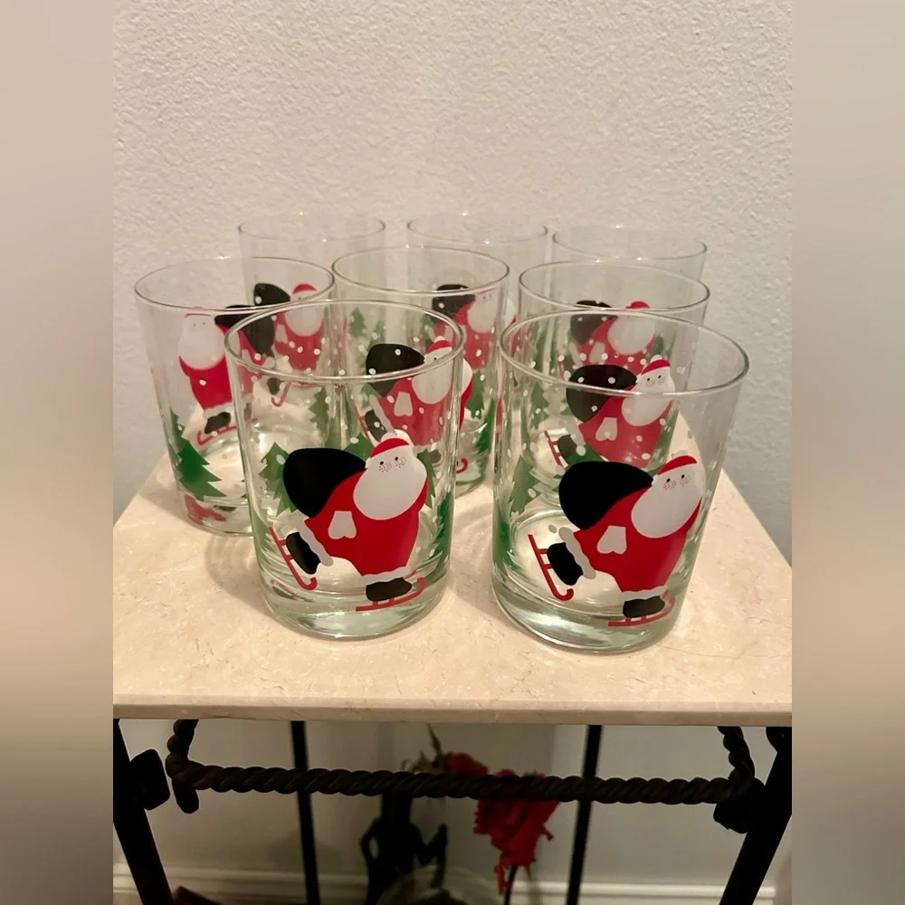 8 Crate & Barrel vintage skating Santa lowball glasses. 12oz